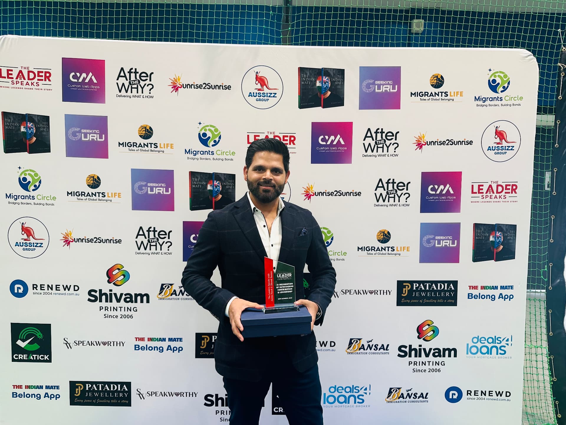 Irshad Siddiqui with The Leader Speaks award