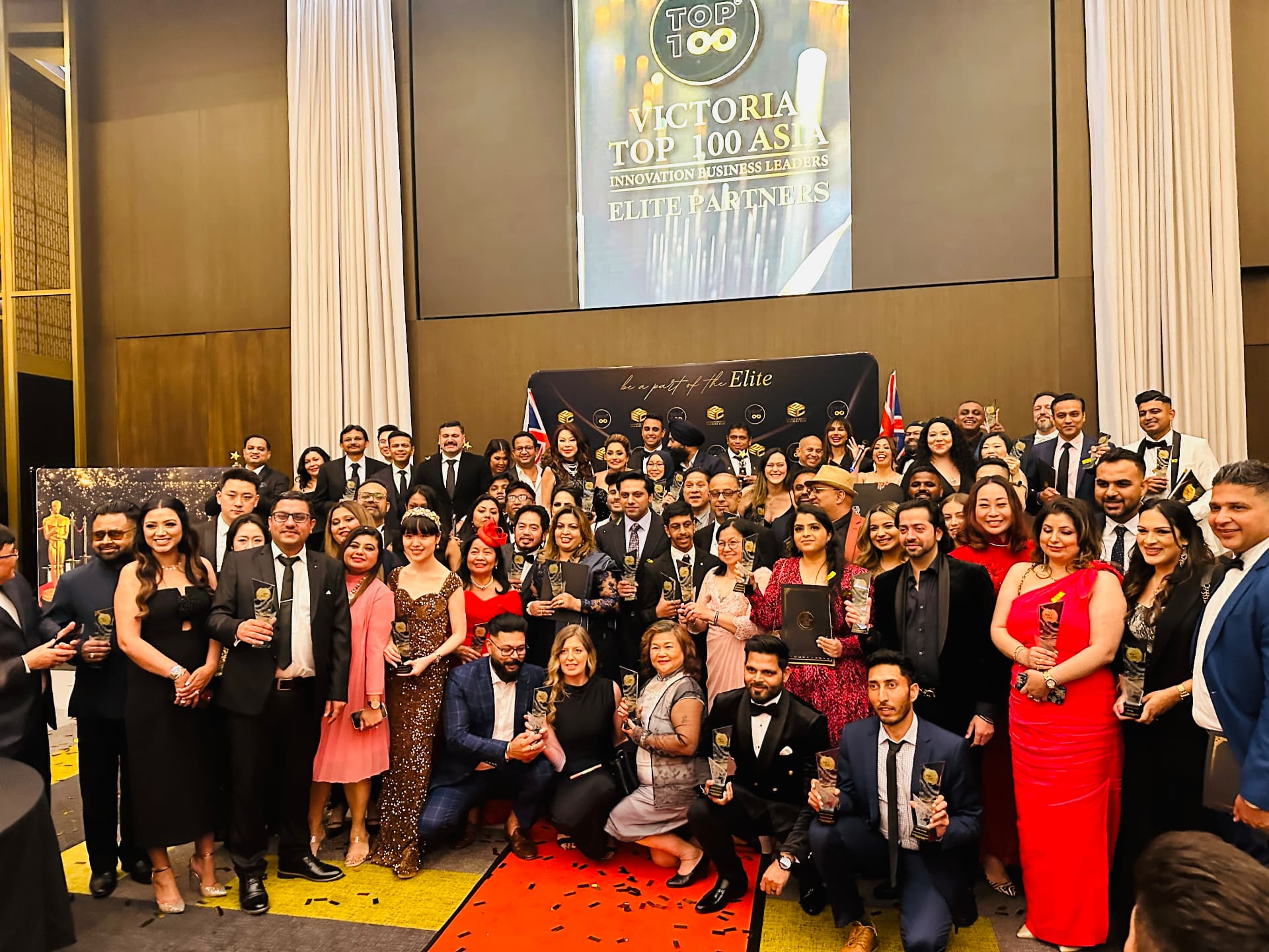 Top 100 award recipients celebrating together