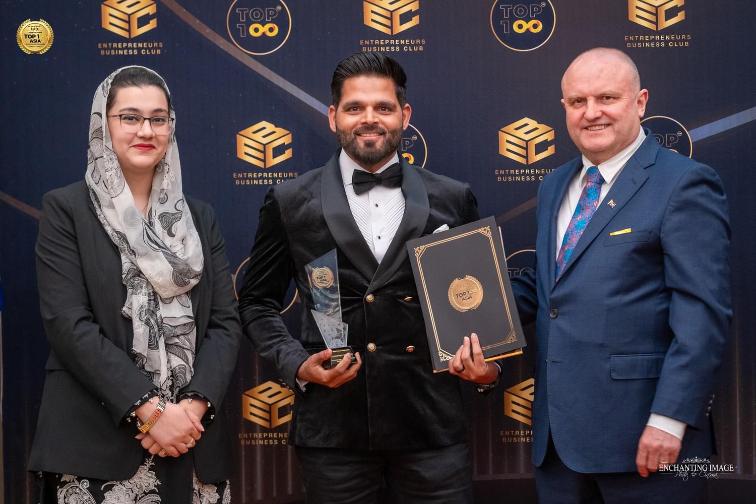 Irshad Siddiqui with his Top 100 Asia award